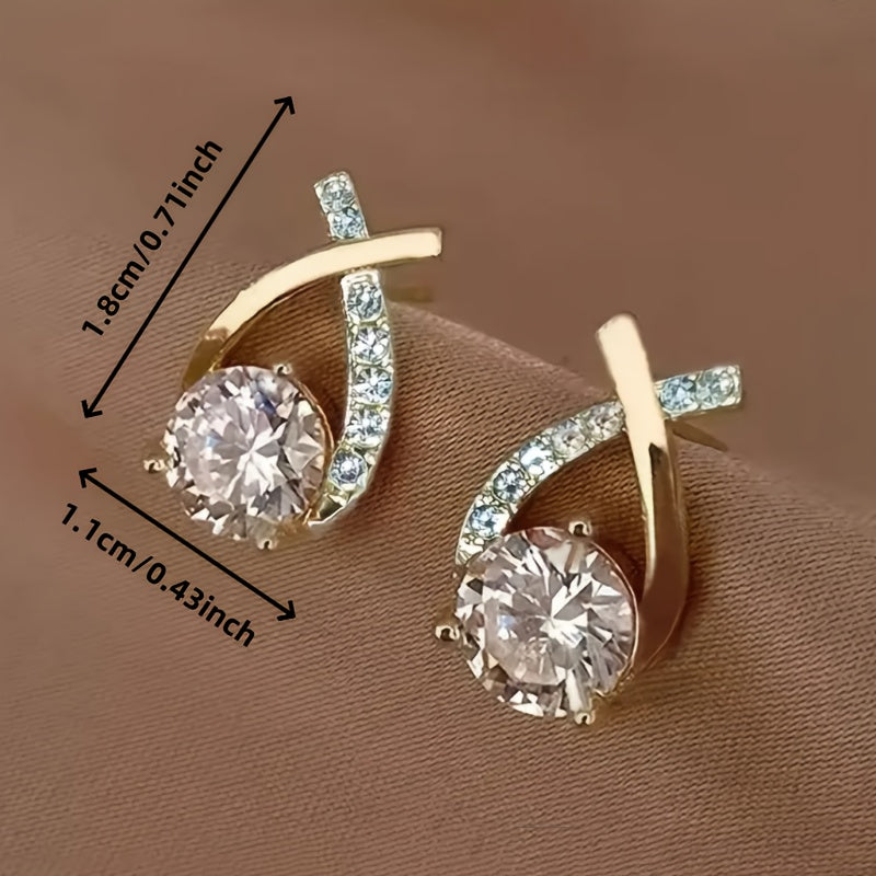 Soledad - Élégantes boucles d’oreilles avec croix dorée et zircon étincelant