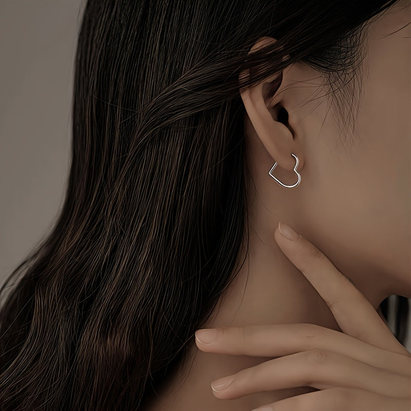 Pilar - Élégantes boucles d’oreilles dorées en forme de cœur en acier inoxydable