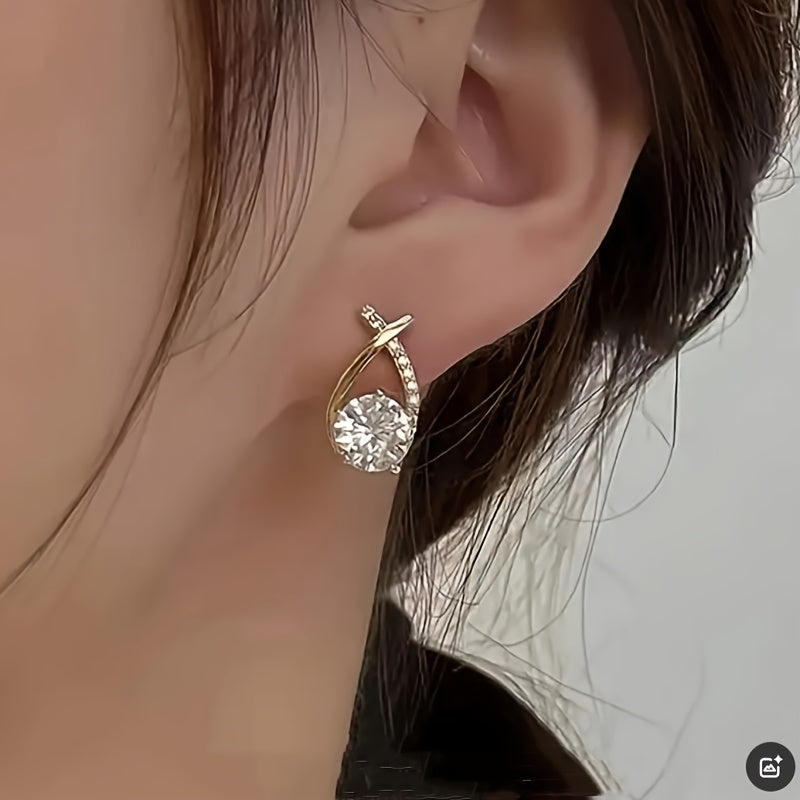 Soledad - Élégantes boucles d’oreilles avec croix dorée et zircon étincelant