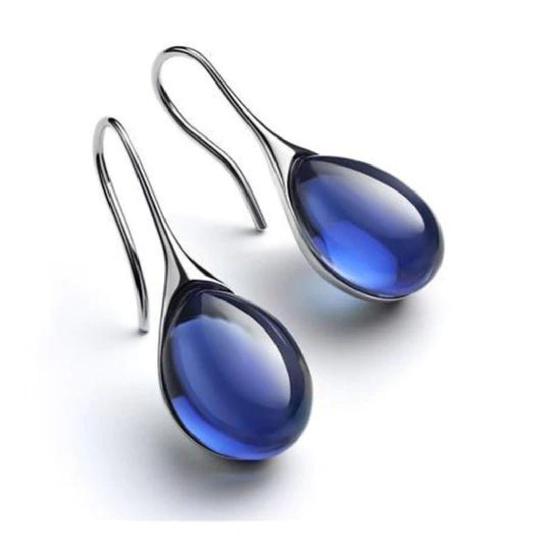 Boucles d'oreilles pendantes chics avec des cristaux