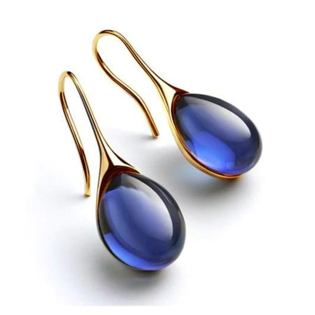 Boucles d'oreilles pendantes chics avec des cristaux