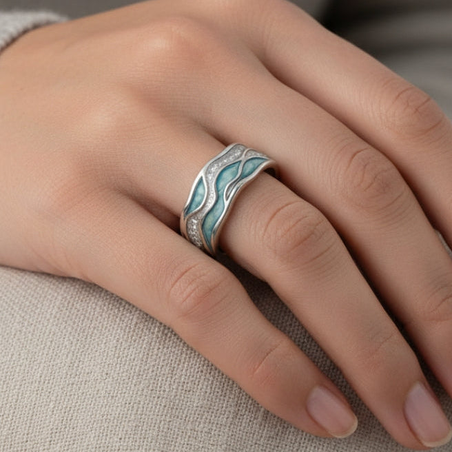 Regina - Bague en argent avec d’élégantes vagues turquoise