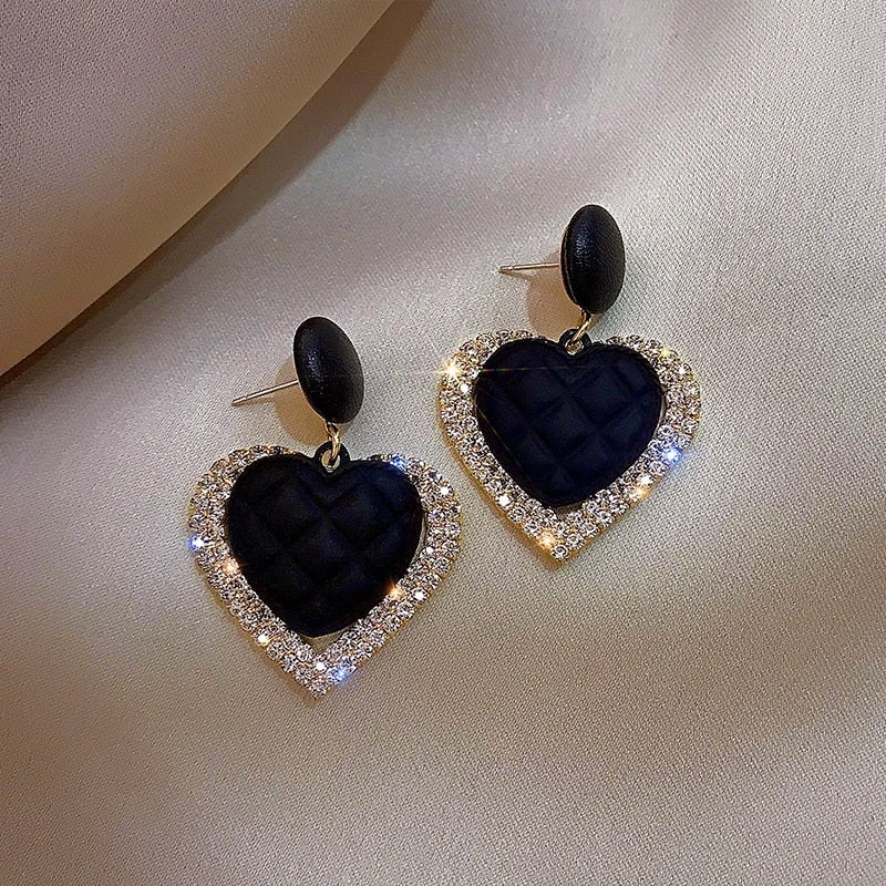 Boucles d'oreilles en forme de cœur en or noir
