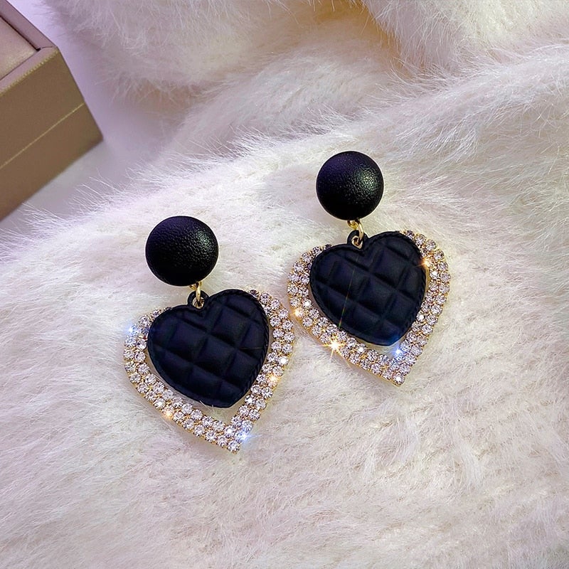 Boucles d'oreilles en forme de cœur en or noir