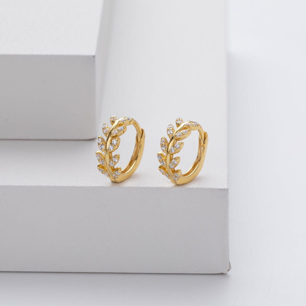 Boucles d'oreilles en forme de feuille argentée