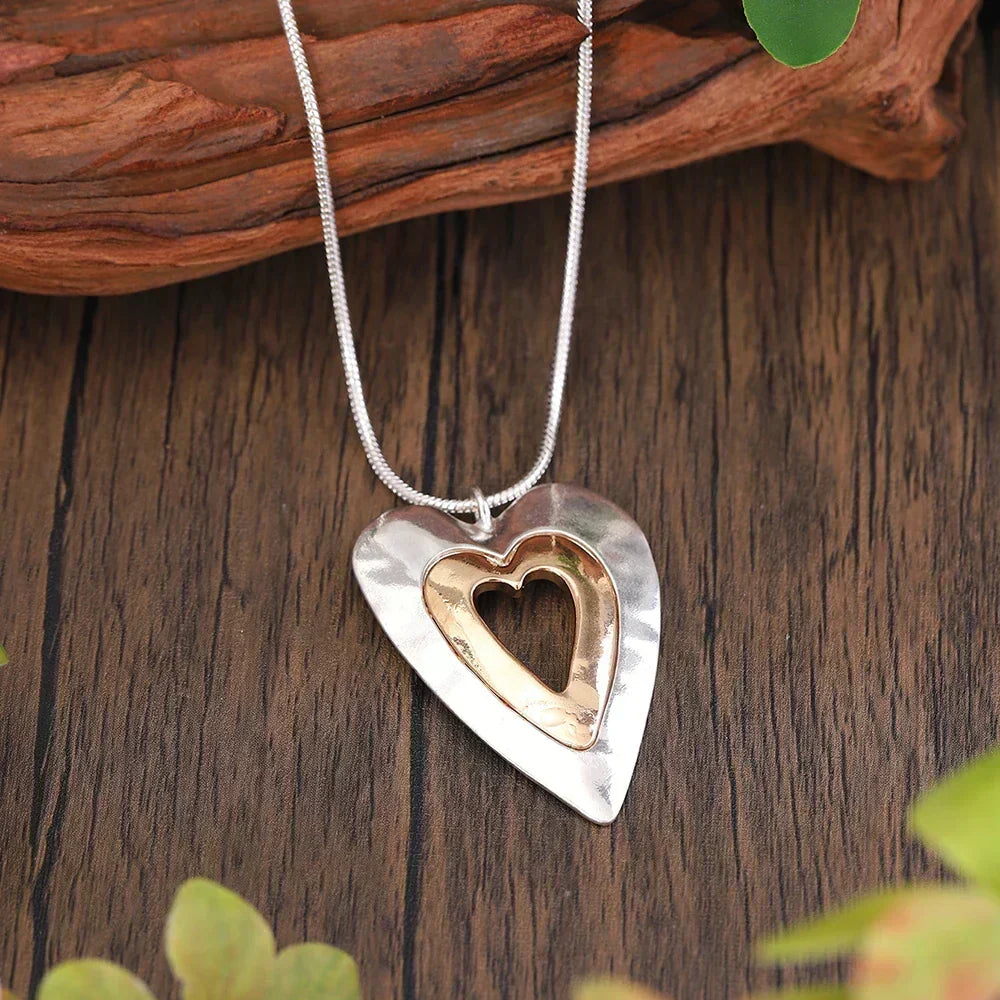 Olga - Collier vintage avec cœur bicolore en argent et en or