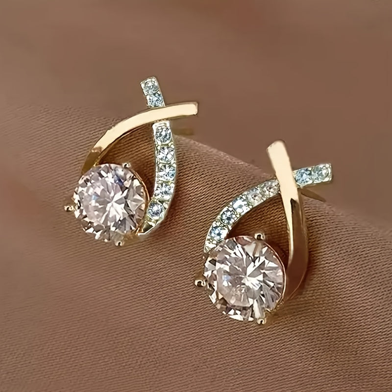 Soledad - Élégantes boucles d’oreilles avec croix dorée et zircon étincelant